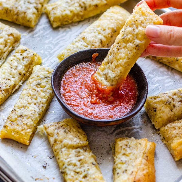 Parmesan Bread Sticks with Marinara Sauce.