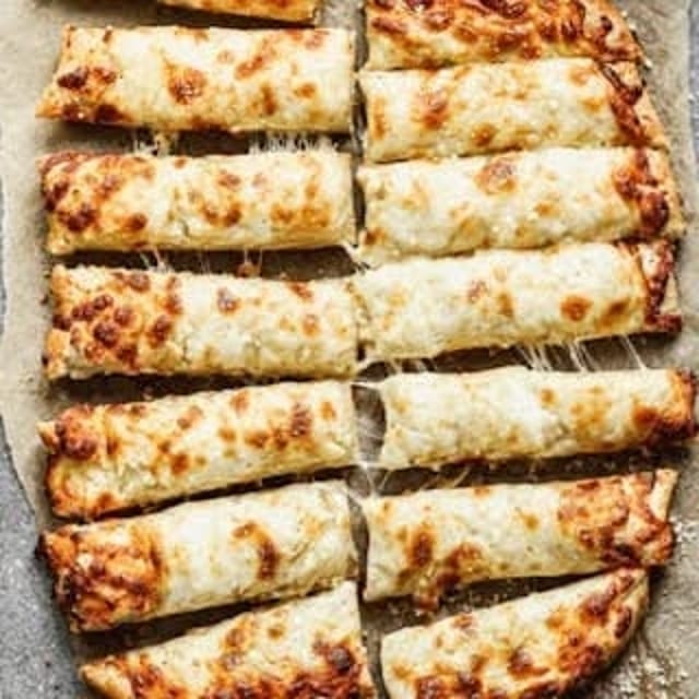 Parmesan Cheesy Bread Sticks with Marinara Sauce Large.
